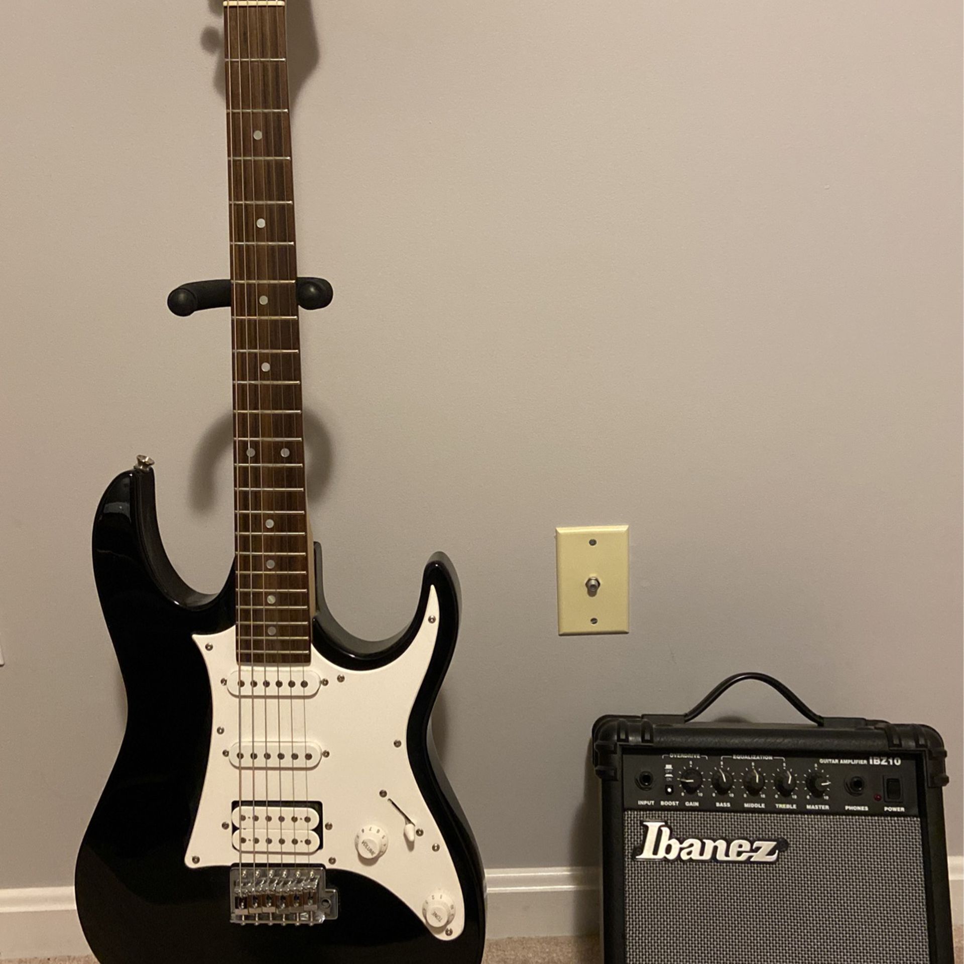 Ibanez  Guitar and Amp With Strap, Tuner, etc.