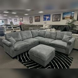 Dark Gray corduroy sectional couch with ottoman