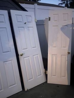 Interior Doors 23 3/8 by 79 two closet doors left