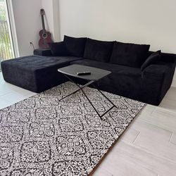 sofa, carpet and table