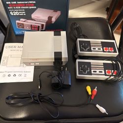 Mini Game Anniversary Edition Entertainment System," a retro-style console with 500 built-in classic games, similar to the NES Classic Edition. It inc