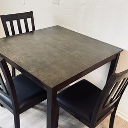 Small dining table and chairs