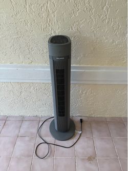 Standing tower oscillating fan