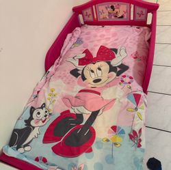Toddler bed with covers and mattress