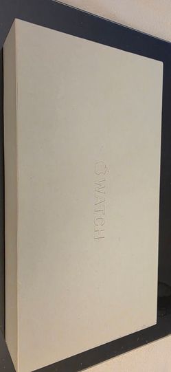New never used Apple Watch Ultra 2 GPS + Cellular 49mm Sport Watch with Natural Titanium Case.
