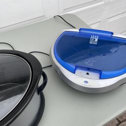 George Foreman Grill and  a Crockpot 