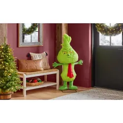 Like new in box! 4 ft. Animated Christmas Grinch- Sings!