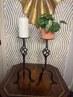 Two vintage wrought iron bronze candle holders
