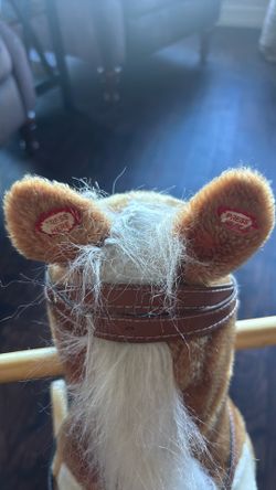 Kids talking rocking horse.