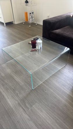 Glass waterfall coffee table