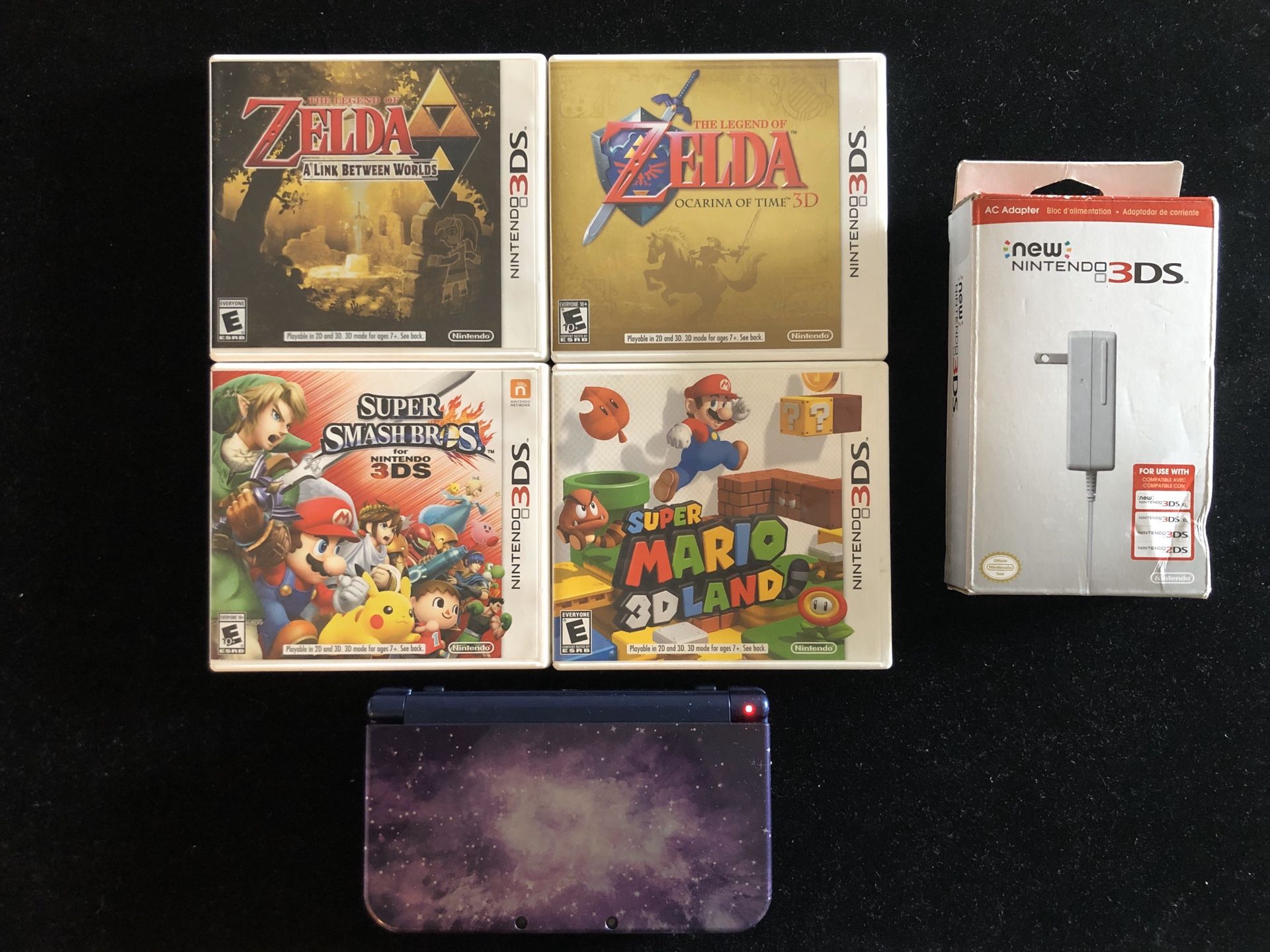 New Nintendo 3DS XL Galaxy Style + 4 Games Smash Bros Zelda Super Mario 3D Land