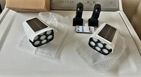 2-in-1 Solar Powered LED Motion Sensor Security Light and Dummy CCTV Camera 2PACK