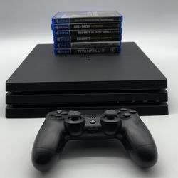 PlayStation 4 Pro 1TB Remote W/6 Games Bundle