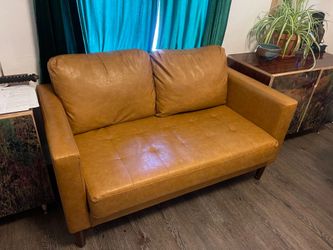 Tan faux leather loveseat