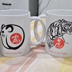 4 New porcelain Chinese zodiac cups. 