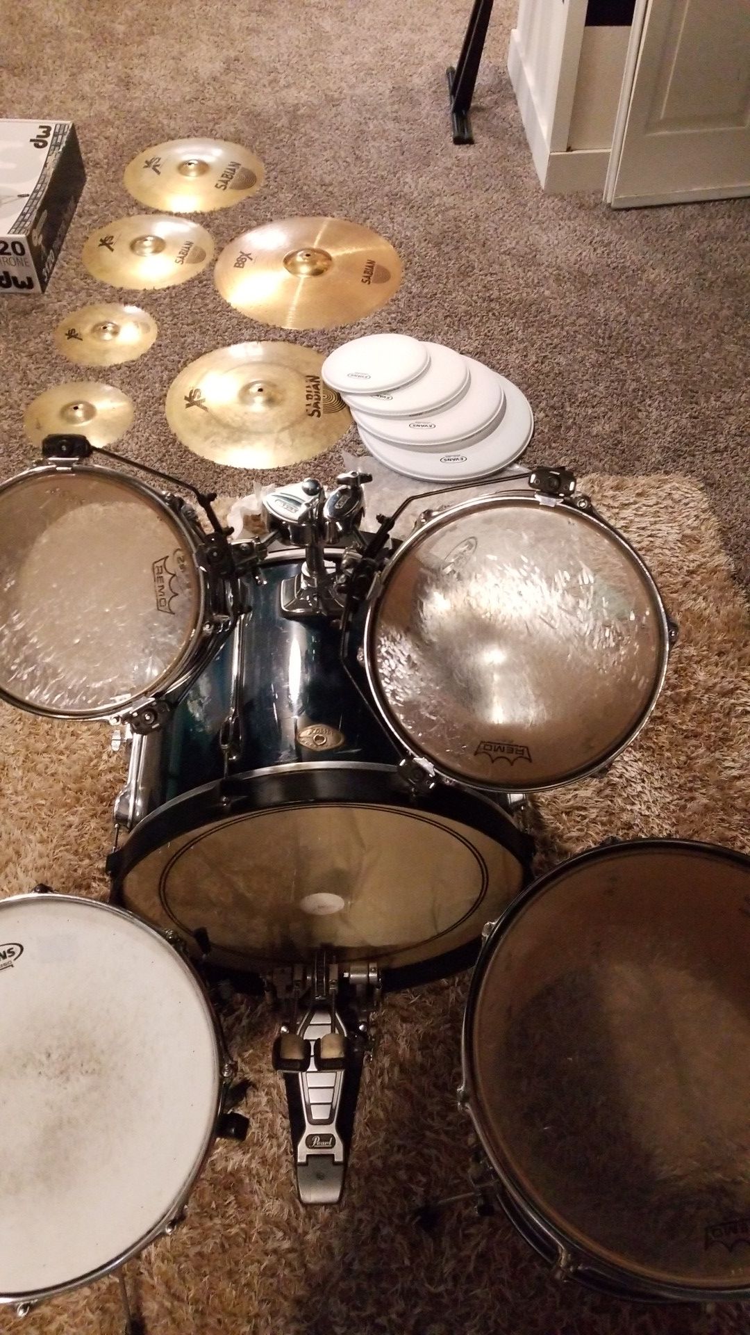 Tama Rockstar Drum Shells, Evans G2 Level 360 Drum Heads, Pearl Kick Pedal, and Sabian Cymbals