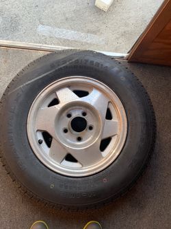 Pair of Trailer Wheels and new tires Great Alloy look