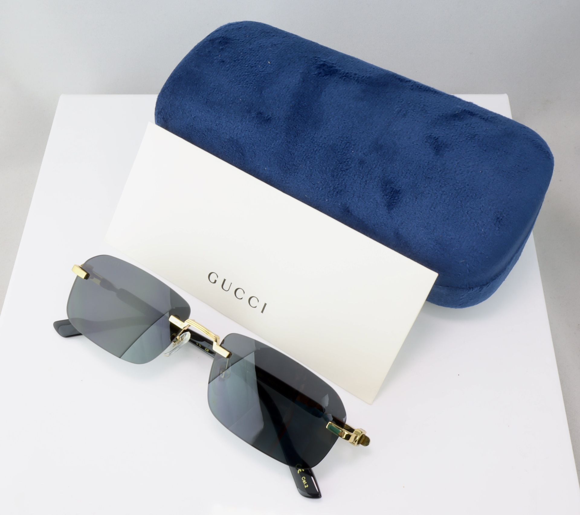 Gucci Rectangle Sunglasses in Gold With Gray Lens