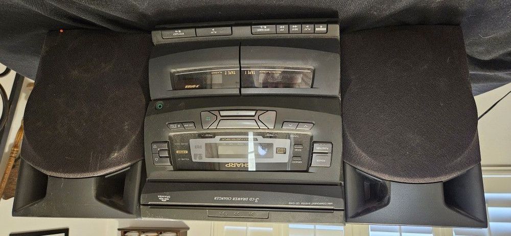 3 drawer Sharp CD stereo and speakers