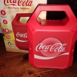 Coca-Cola branded mini party speaker featuring Bluetooth connectivity and RGB LED lights