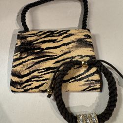 Brown braided bracelet with gold/clear rhinestone bar charm w/animal print pouch 