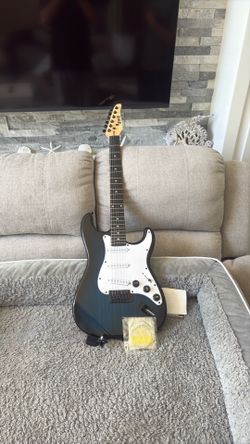 LYX pro electric guitar and tuner