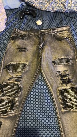 Heavily Distressed Gray Ripped Jeans