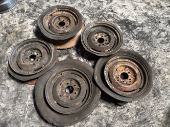 Five matching 15x5 Chevy car wheels with clips. 5 on 4.75 lug 49-53