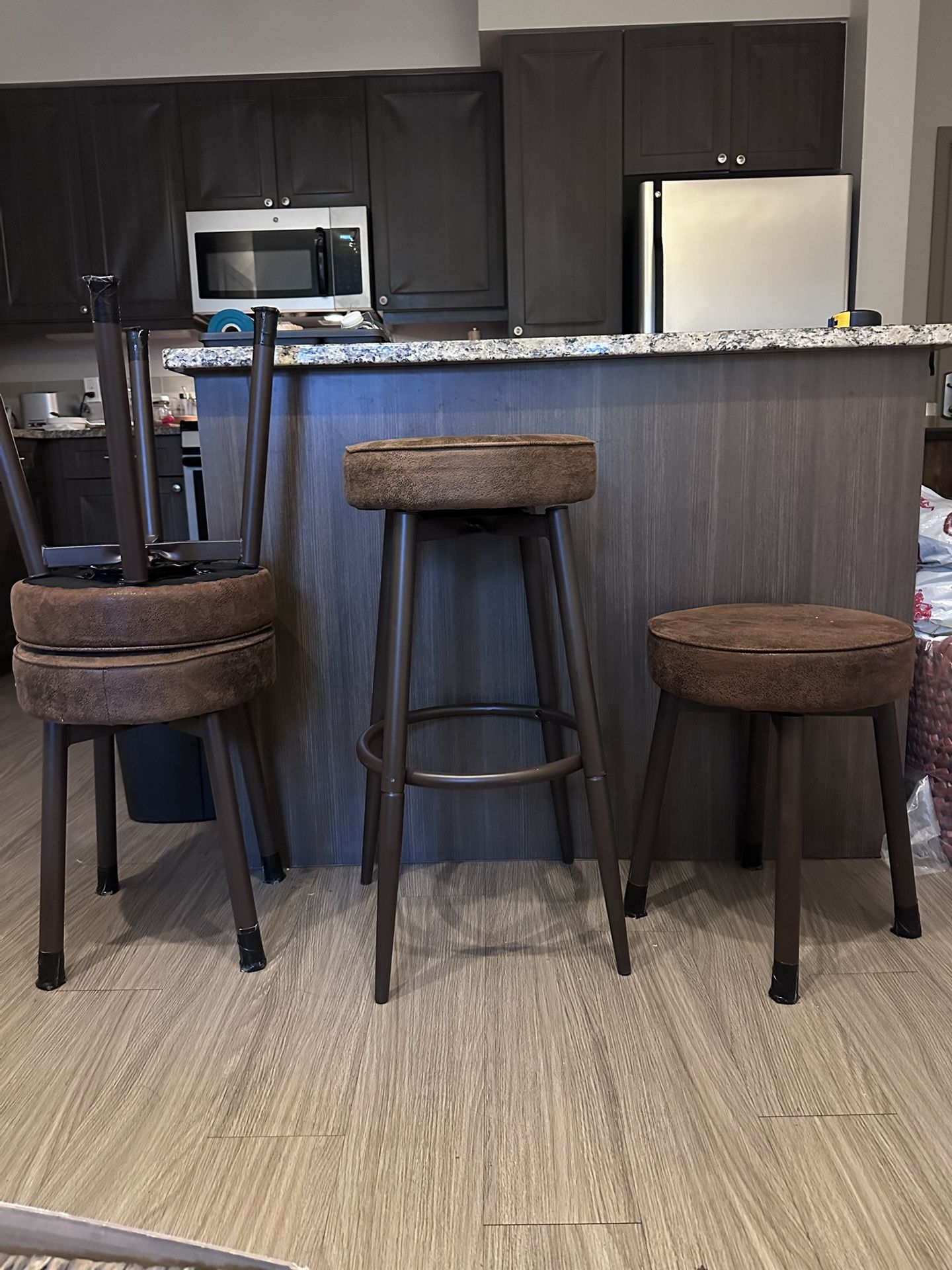 Move Out Sale!!! $90 Set of 4 Adjustable Bar Stools – Brown Faux Leather + Metal