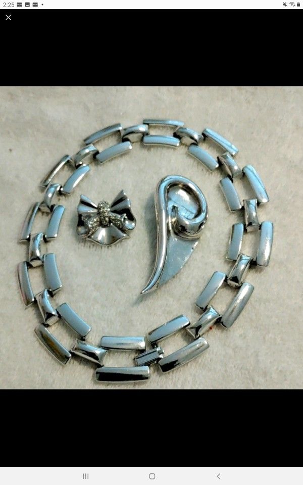 One necklace and Two brooches.