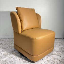 New in box caramel brown 360” swivel barrel accent chair with pillow