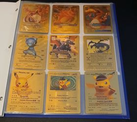 Binder of 27 Pokémon cards. $10 for everything together. Includes Charizard, Mew, Pikachu and more