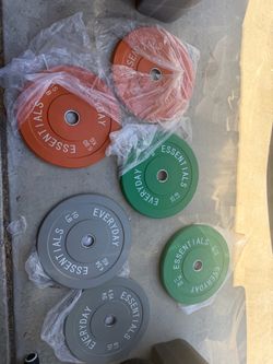 Brand new Olympic bumper weight plates