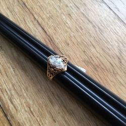 Gold plate ring with marquis cut cz