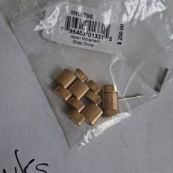 Michael KORS STAINLESS STEEL,  GOLDTONE LINKS. MODELMK5798