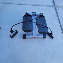 Elliptical machine under desk