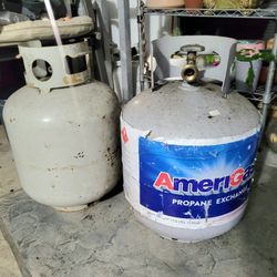 Two Empty Propane Cylinders.  