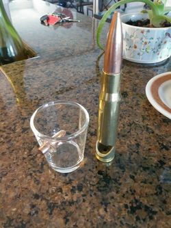 50cal bottle opener and 308 shot glass
