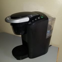 Black Keurig coffee maker 