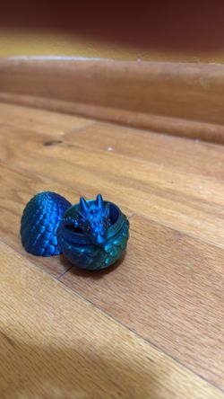 Dark blue 3-D printed dragon