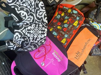 Black tote with multiple lunch bags