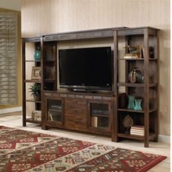 Mahogany wood cabinet with side shelving.  Gorgeous stone accents.