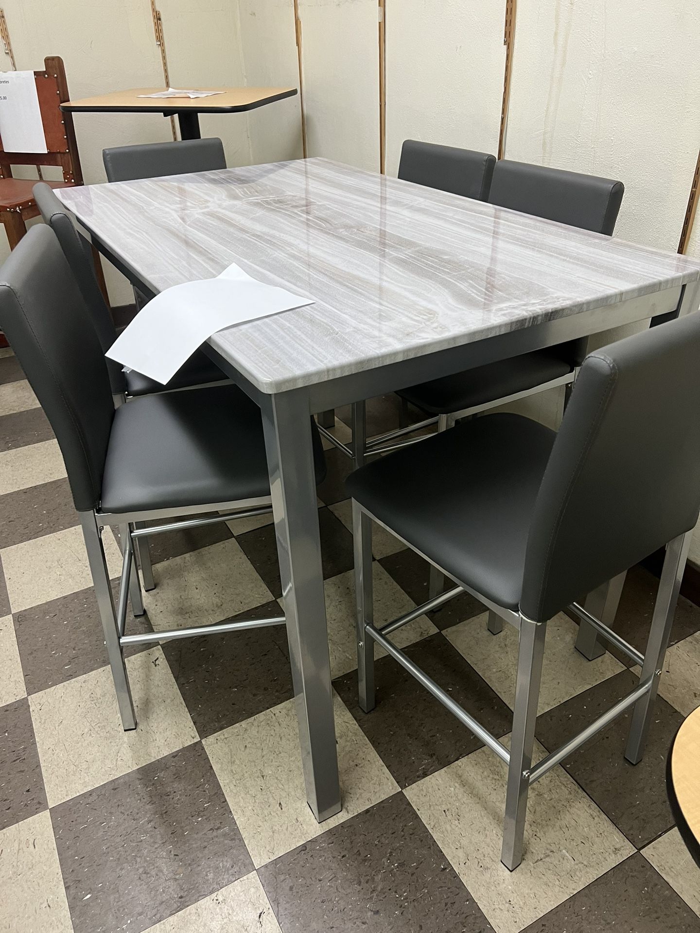 Dinette with six stools, 699