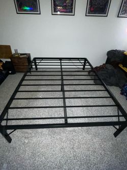 Queen size bed frame with storage space underneath