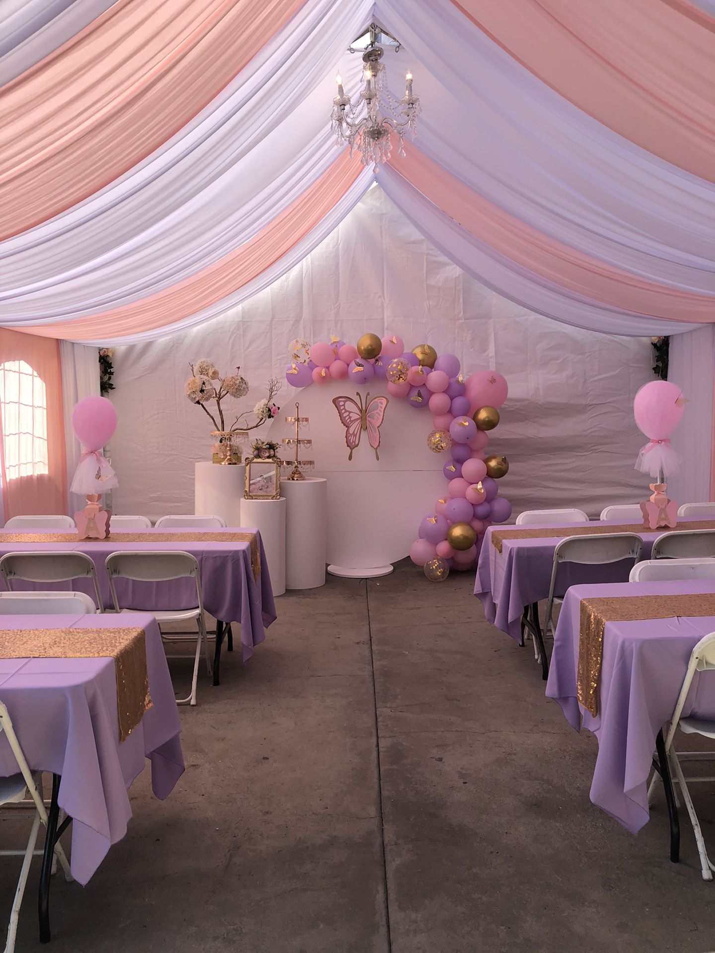Party setup / party decorations/ butterfly theme/ artificial flowers/ drapes/ backdrop/ balloon garland