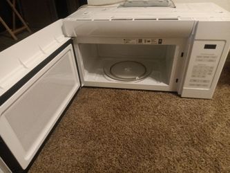 GE Appliances Over the range Microwave  White