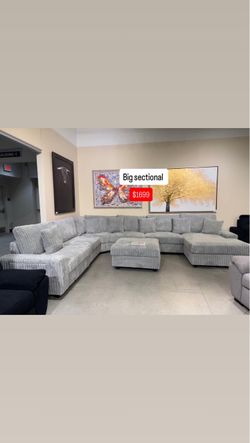 Large Gray Corduroy Sectional Sofa with Ottoman