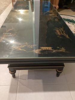 Long Oriental Design Coffee Table With Bottom Shelf And Glass Protective Asking $425. Obo