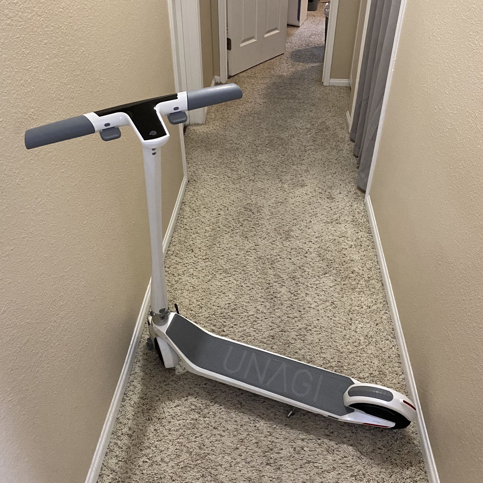 Used Unagi Model One Classic Electric Scooter with Carry Satchel