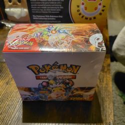 Surging Sparks Booster Box And Pokémon Day 2026